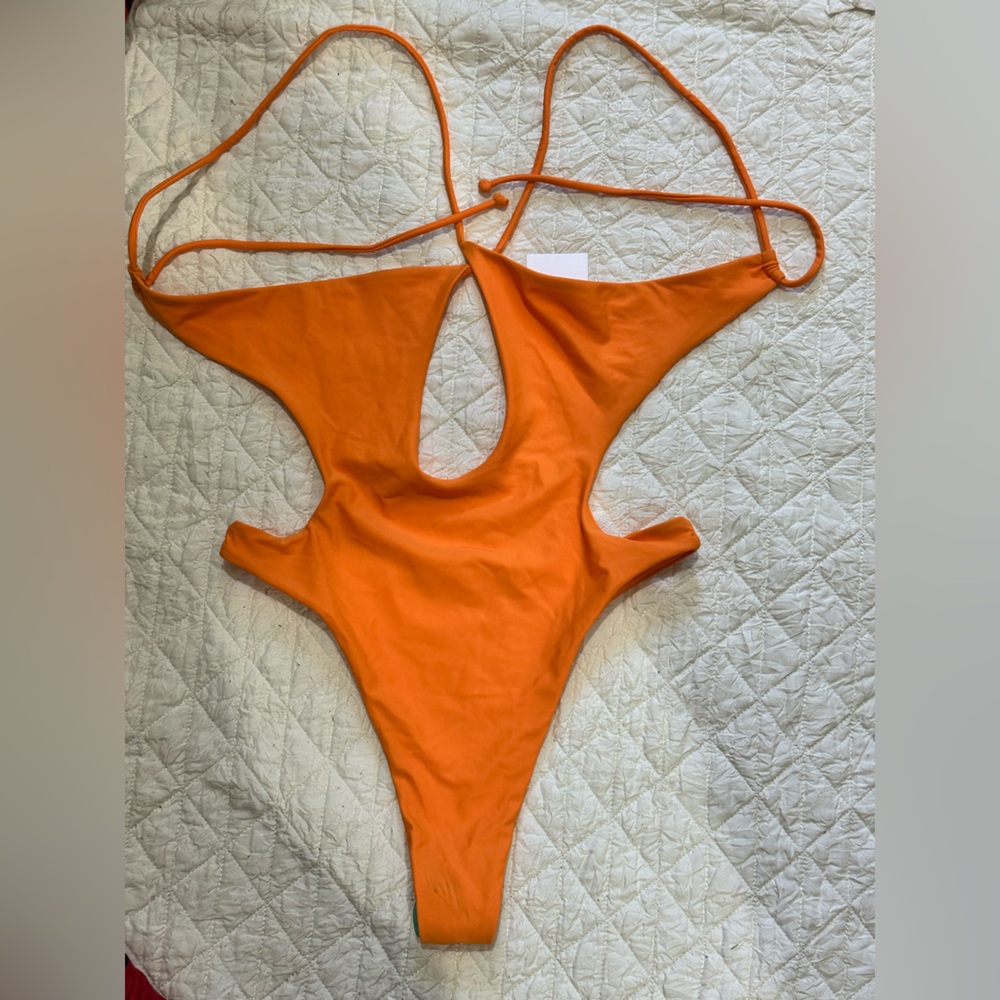 White Fox Boutique Orange Bodysuit with Bold Cutouts
